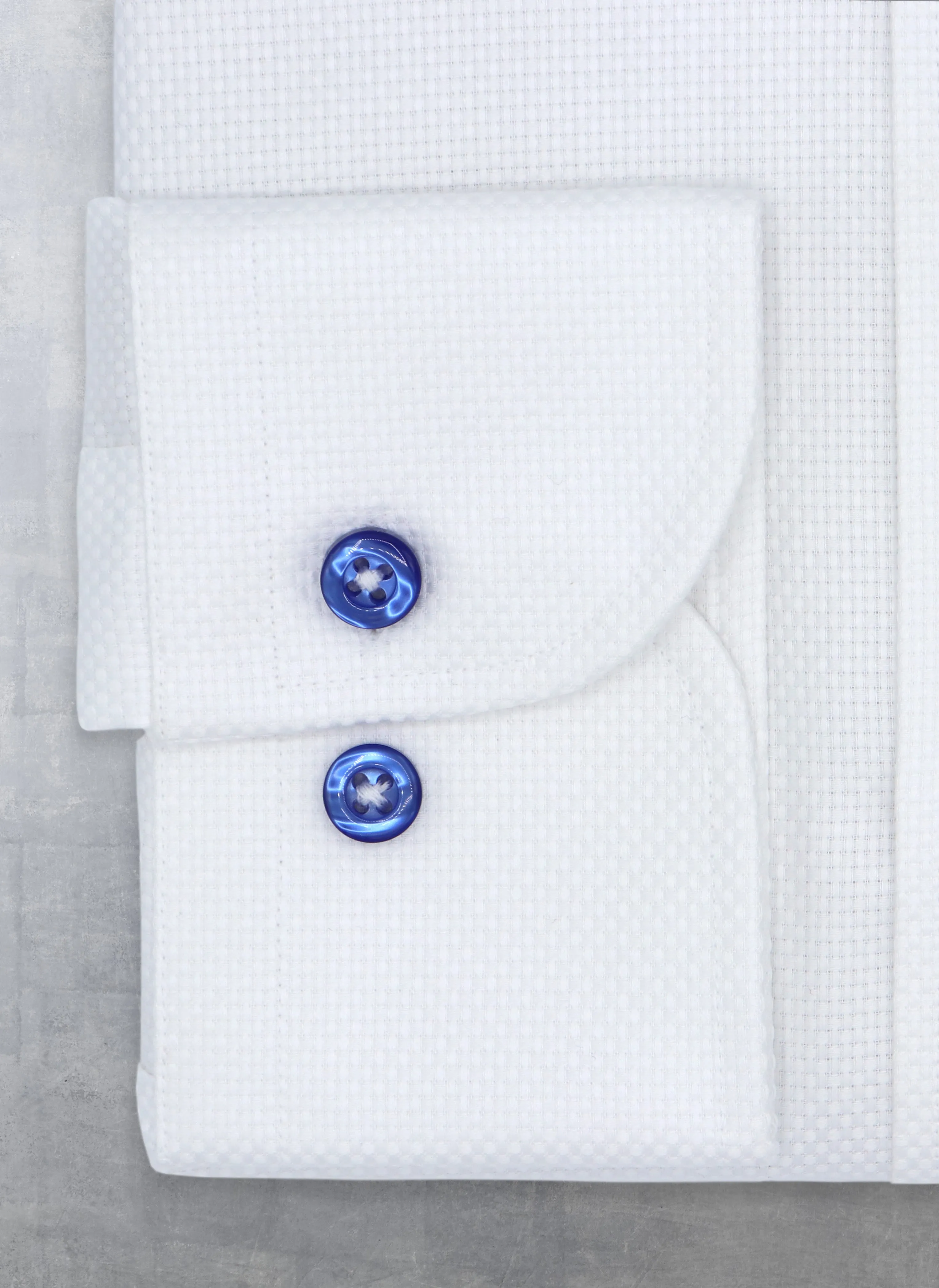 Alexander in White Solid Textured with Contrast Navy Buttons Shirt