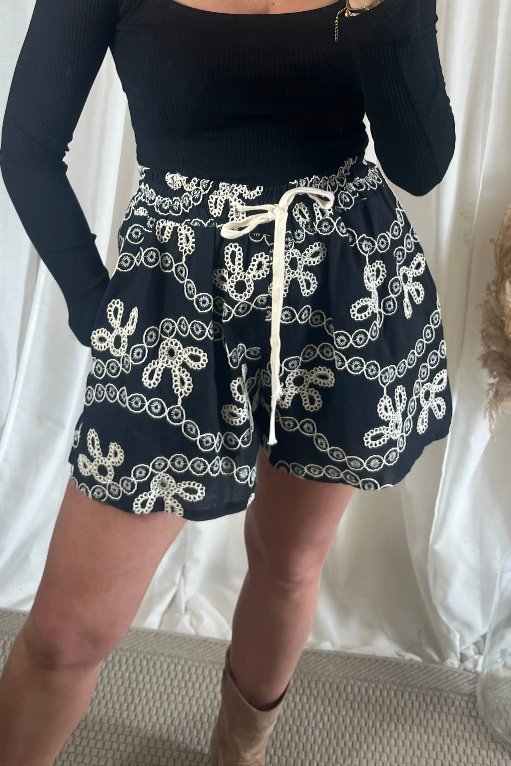 Black elasticated cream embroidered shorts